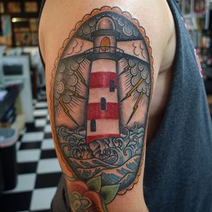 A gorgeous take on the traditional lighthouse by Mike Reed. (Via IG - mikereedtattoo) #MikeReed #traditional #lighthouse