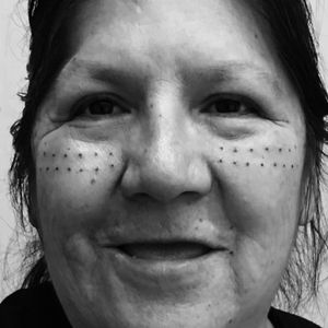 An indigenous woman with traditional facial tattoos. #IndigenousTattooGathering2017 #OnamanCollective #tattoorevival