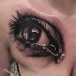 Stunning looking eye tattoo. #claudiareato #eye #realistic #blackandgray #realism #realisticeye #blackandwhite
