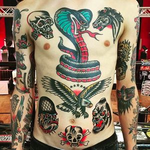 Rad and powerful frontal tattoos by Alex Wild. #AlexWild #traditionaltattoo #boldtattoos #fronttattoos #eagle #bulldog #gorilla #crossbones #cobra #skull #horse