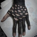 Radical hand tattoo by Anich Andrew. #handtattoo #geometric #geomtry #blackwork #black #anichandrew