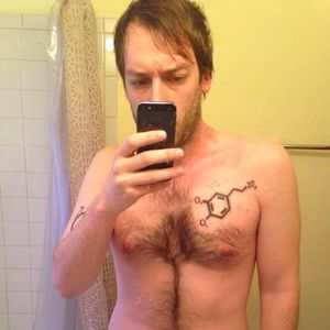 Nick Wood's handsome chest, featuring a molecule tattoo by Steve Birr (IG -- stevebirrtattoo) (image via Nick Woods) #directhit #molecule #stevebirr