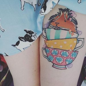 Cute guinea pig chilling out in some teacups. Tattoo by Sam Whitehead. #cute #pastel #girly #guineapig #teacup #traditional #SamWhitehead