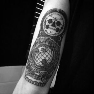 Russian doll tattoo by Toma Pegaz #TomaPegaz #blackwork #russiandoll #skull #snake #globe #matryoshka