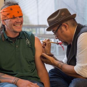 A member of the Mohawk nation getting a traditional tattoo from Michael Galban. Photo by Alex Hamer #culturalpreservation #Iroquois #MichaelGalban #TheGanondaganMuseum #traditional #tribal