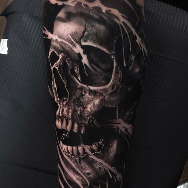 Skull tattoo by Miroslavart #miroslavart #coveruptattoos #skull #blackandgrey #realism #realistic #hyperrealism #bones #death #teath #smoke #barbedwire #ghost #tattoooftheday