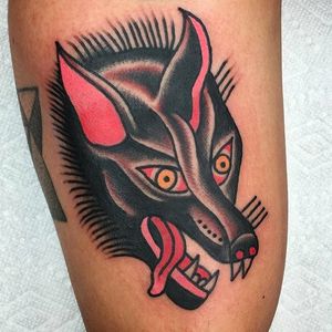 Nasty looking wolf head tattoo. Solid work by Jason Ochoa. #JasonOchoa #GreenPointTattooCo #traditionaltattoo #boldtattoos #wolf #head