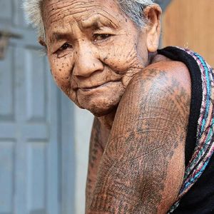 Nepalese great-grandmother, photography by Travelin' Mick #TravelinMick #tribes #tribal #facetattoos #womenwithtattoos #tattooedwomen