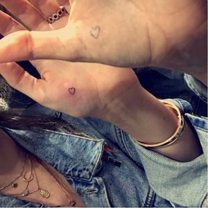 More friendship tattoos... More open hearts #bellathorne #celebrity #microtattoo