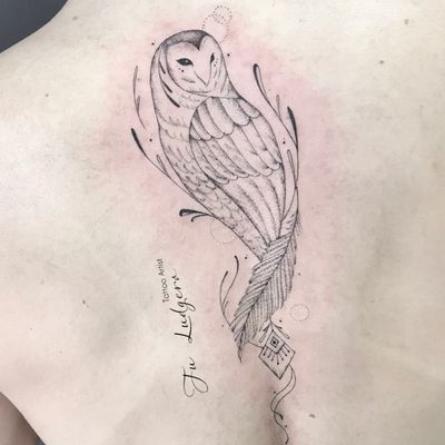 barn owl feather tattoo