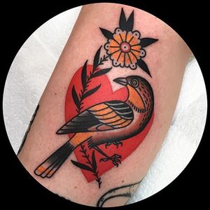 Bird in a heart tattoo by Leonie New. #LeonieNew #traditional #bird #heart #negativespace