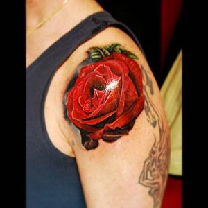 Ravishing red rose tattoo by Justin Buduo. #realism #colorrealism #JustinBuduo #flower #rose #redrose