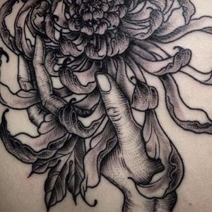 Rich floral design in this chrysanthemum tattoo. Photo from Matina Marinou on Instagram #MatinaMarinou #blackworker #pointillism #dotwork #blackandgrey #woodcut #etching #engraving #crysanthemum