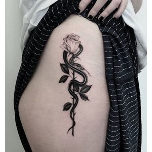 Serpent and rose tattoo by Sera Helen. #SeraHelen #blackwork #oldschool #fineline #classic #rose #serpent #snake
