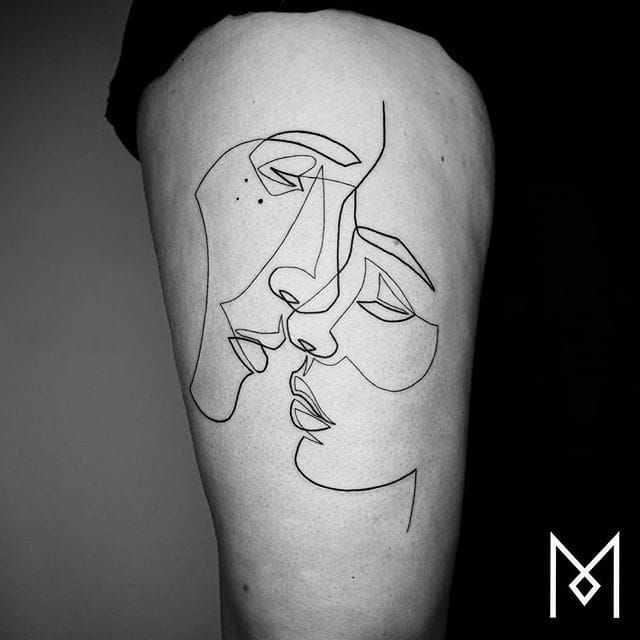 Faces tattoo 2 kissing Tattoo Meanings