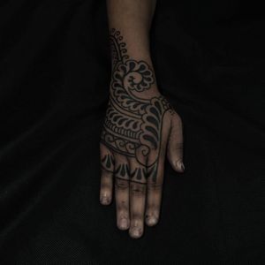Tribal tattoo by Or Kantor #OrKantor #handtattoos #blackwork #linework #pattern #ornamental #tribal #floral #swirls #dotwork #tattoooftheday