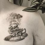 Tempest in a Tea Cup tattoo by The Hanged #thehanged #octopustattoos #blackandgrey #dotwork #teacup #ocean #waves #storm #boat #ship #cloud #lightning #rain #detailed #leaves #floral #tattoooftheday
