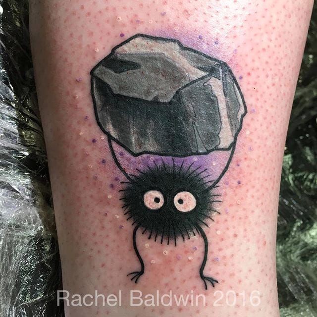 Hand poked Soot Sprites tattooed on the ankle using UV