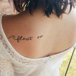 Float On in fancy script on someone's back. (via IG—maidmariane) #PlayItAgain #FloatOn #ModestMouse #MusicTattoo #LyricsTattoo