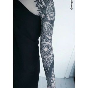 Amazing sleeve tattoo, check out the mandala on the crease. Rad tattoo by Keegan Sweeney. #KeeganSweeney #keegstattoo #geometrictattoo #rose #mandala #sleeve #blackwork