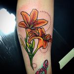 Twin tiger lily tattoos by Kaia Holbrook. #flower #tigerlily #neotraditional #botanical #KaiaHolbrook