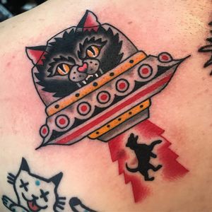 Space cat abducts dog tattoo by Phil DeAngulo #PhilDeAngulo #spacetattoos #color #traditional #ufo #alien #cat #kitty #monster #dog #abduction #spaceship #scifi #space #travel