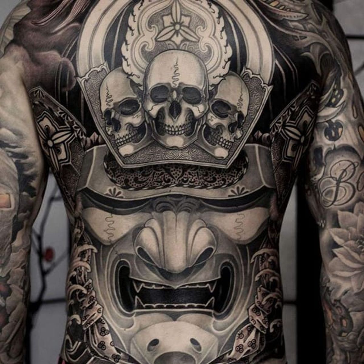 Tattoo uploaded by Ross Howerton • A giant samurai mask with a crest of  skulls from Kostas Tzikalagias' (IG—kostas_tzikalagias) portfolio.  #blackandgrey #Japanese #KostasTzikalagias #samurai #skulls • Tattoodo
