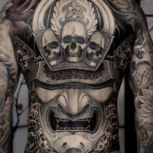 A giant samurai mask with a crest of skulls from Kostas Tzikalagias' (IG—kostas_tzikalagias) portfolio. #blackandgrey #Japanese #KostasTzikalagias #samurai #skulls