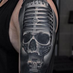 Rad skull morph tattoo by Evgeniy Goryachiy aka U-Gene #EvgeniyGoryachiy #UGene #realistic #skull #skullmorph #microphone