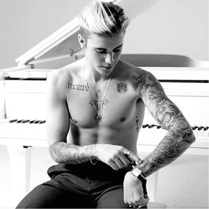 A casual photo of Justin Bieber shirtless, you know, playing piano and touching himself #JustinBieber #celebrity
