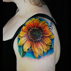 Color realism sunflower tattoo by Justin Buduo. #realism #colorrealism #JustinBuduo #flower #sunflower