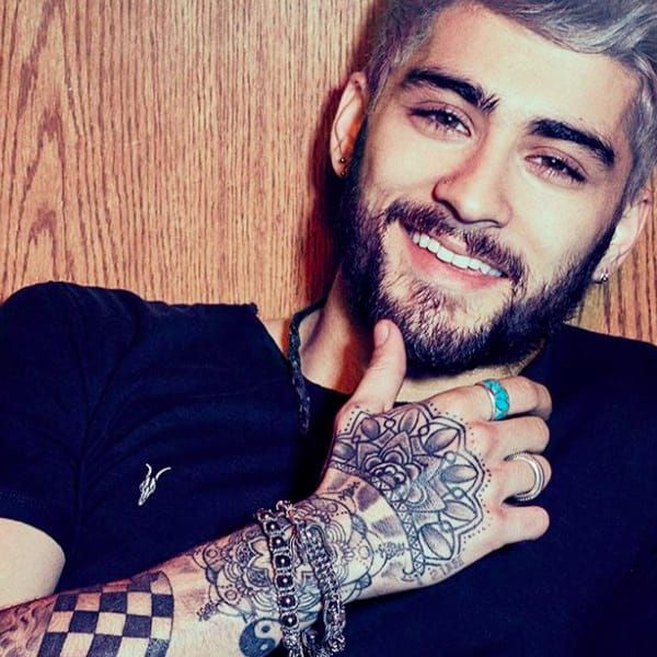 Tattoo uploaded by Tattoodo • Zayn Malik and his dope collection of 