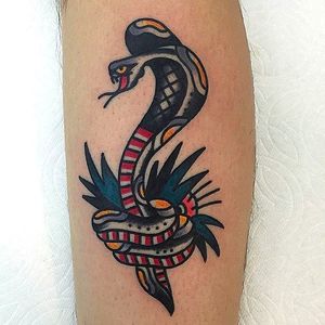 Simple yet solid cobra tattoo done by Joshua Marks. #JoshuaMarks #ETS #traditionaltattoos #boldtattoos #classic #cobra