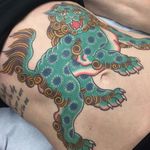 We love this crazily colored lion by Brad Stevens. #BradStevens #Traditional #bold #lion #stomach