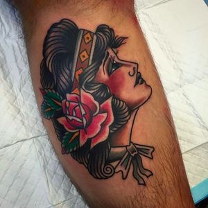 Again, a girl's head, this time with a solid rose by Ben Hastings. #benhastings #traditionaltattoo #girlhead