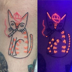 UV Stoner cat tattoo by Kayla Newell #KaylaNewell #weedtattoos #linework #dotwork #UV #UVink #UVtattoo #cat #kitty #hat #smoking #joint #smoke #stoner #petportrait #marijuana #tattoooftheday