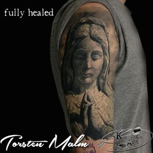 Virgin Mary statue tattoo by Torsten Malm. #realism #statue #VirginMary #TorstenMalm