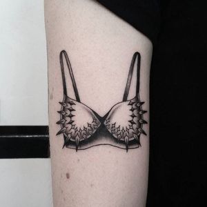 Spiked bra tattoo by Sera Helen. #SeraHelen #blackwork #oldschool #fineline #classic #bra #feminist #feminism