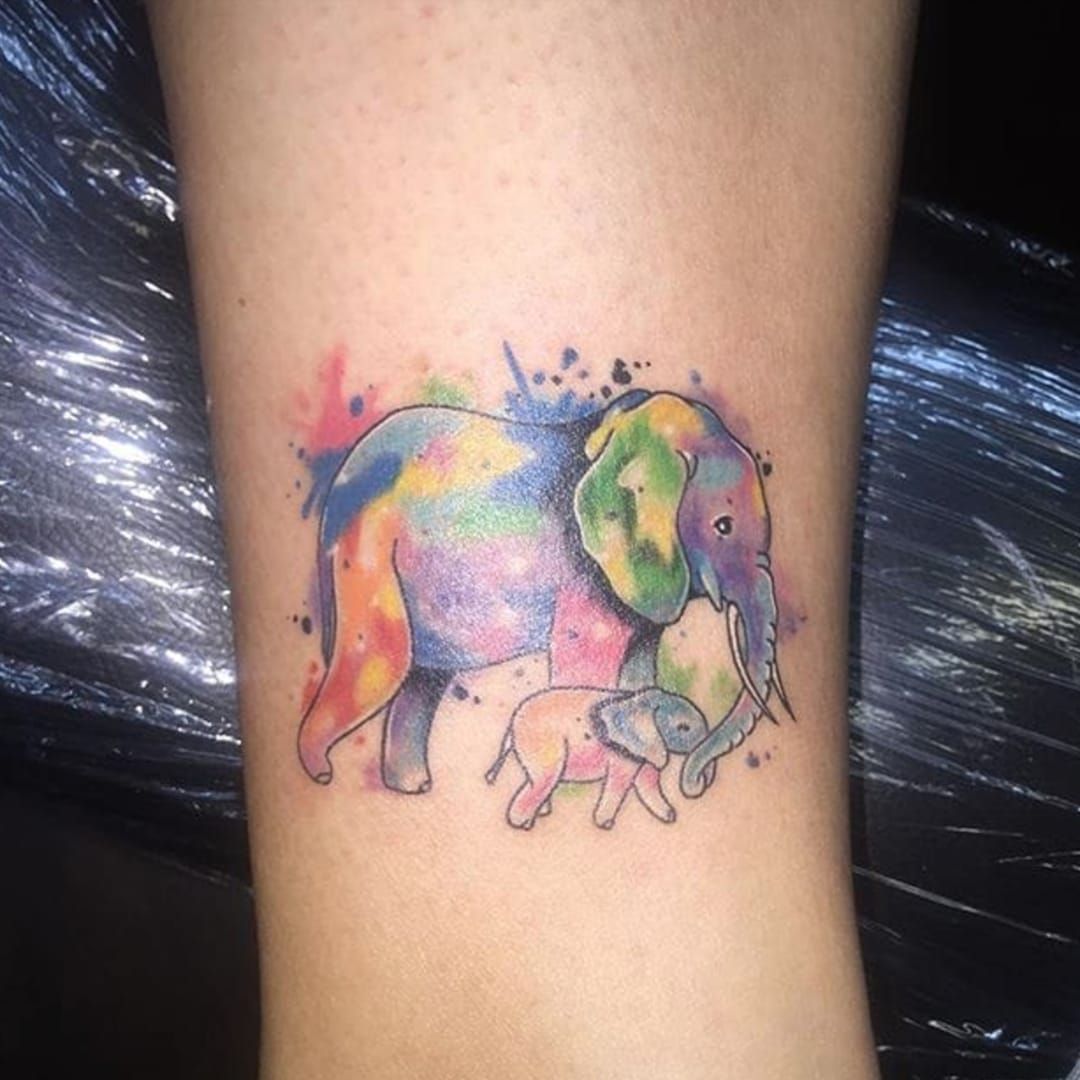 Sweet Elephant Tattoo Commemorating Motherhood by Rain colortattoo  watercolortattoo   Colorful elephant tattoo Elephant tattoo design  Elephant family tattoo