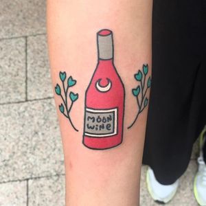 Moon Wine tattoo by Kimsany #Kimsany #drinktattoos #color #newtraditional #bottle #moon #wine #branches #leaves #leaf #floral #wino #alcohol