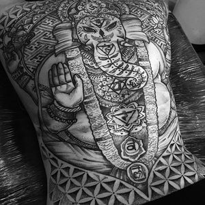Massive Ganesha back tattoo done by Paul Davies. #pauldavies #blacktattoo #illustrativetattoo #geometrictattoo #dotstolines #ganesh