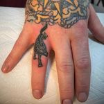 A wolf prowls down a finger, by Ben Grillo (via IG—bengrillo) #microtattoo #smalltattoo #tinytattoo #TattooRoundUp