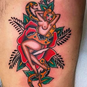Rad pinup girl with snake and rose. Tattoo by Jaclyn Rehe. #JaclynRehe #ChapelTattoo #traditional #girl #girlhead #girlsgirlsgirls #snake #rose #pinup