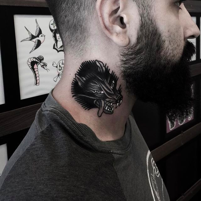 Wolf tattoo on a neck by oneshottattoo  Tattoogridnet