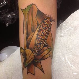 Multi-color ear of corn tattoo by @hurricanesyl. #neotraditional #corn #hurricanesyl #vegetable #grain