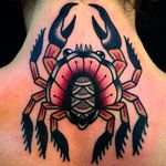 Beautfilly executed upper back tattoo, an awesome and clean looking crab. Excellent work by Giacomo Fiammenghi. #GiacomoFiammenghi #crab #traditionaltattoo #neotraditional #coloredtattoo
