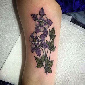 Inner arm neo traditional purple columbine flower tattoo by Lydia Hazelton. #flower #floral #columbine #columbineflower #LydiaHazelton #neotraditional