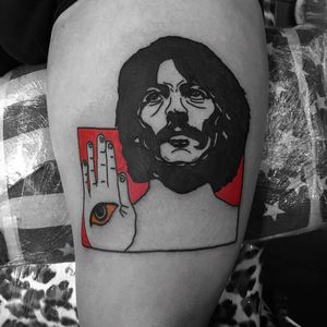 George Harrison tattoo by Noil Culture #NoilCulture #musictattoos #blackfill #color #abstract #minimal #portrait #newtraditional #surreal #thirdeye #georgeharrison #thebeatles #rockandroll #hand #tattoooftheday