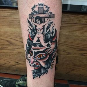 A demon mashed up with a crucified virgin via Shaun Bailey (IG—bailey_tattooer). #crucifix #dark #demon #ShaunBailey #traditional #virgin