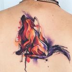 Wolf Tattoo by Adrian Bascur #Watercolor #WatercolorTattoos #WatercolorArtists #BoldWatercolor #BestWatercolor #ModernTattoos #ContemporaryTattoos #AdrianBascur
